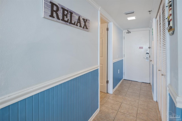 24230 Perdido Beach Blvd Unit 3087, Orange Beach, AL 36561 - hall featuring crown molding and light tile patterned floors