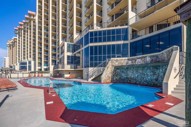 24230 Perdido Beach Blvd Unit 3087, Orange Beach, AL 36561 - view of swimming pool with pool water feature and a patio area