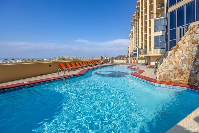 24230 Perdido Beach Blvd Unit 3087, Orange Beach, AL 36561 - view of pool with a patio