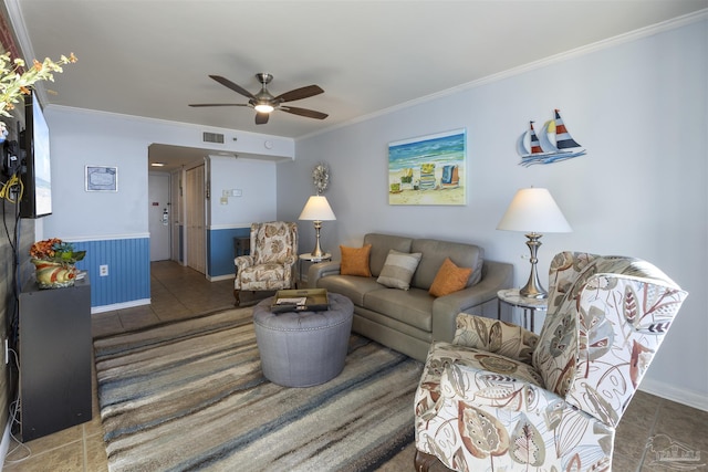 24230 Perdido Beach Blvd Unit 3087, Orange Beach, AL 36561 - living room with ceiling fan, dark tile patterned flooring, and ornamental molding
