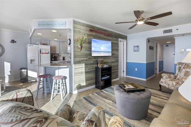 24230 Perdido Beach Blvd Unit 3087, Orange Beach, AL 36561 - living room featuring light tile patterned floors, ceiling fan, and ornamental molding
