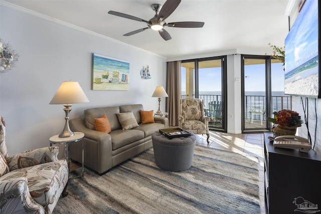 24230 Perdido Beach Blvd Unit 3087, Orange Beach, AL 36561 - living room with crown molding, ceiling fan, and a wall of windows
