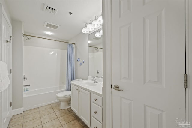 full bathroom featuring toilet, vanity, tile patterned flooring, and shower / bathtub combination with curtain