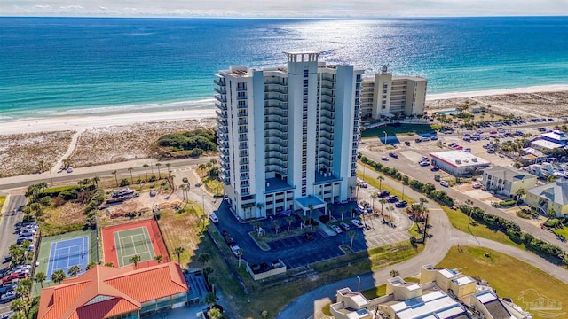 drone / aerial view featuring a view of the beach and a water view