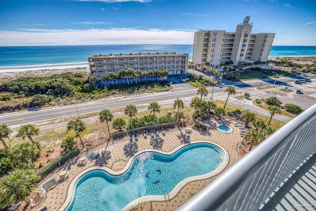 aerial view with a water view and a view of the beach