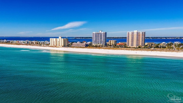 aerial view featuring a water view and a beach view