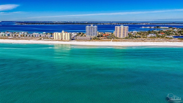 bird's eye view with a water view and a view of the beach