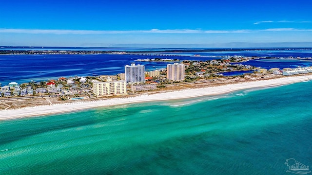 drone / aerial view with a water view and a view of the beach