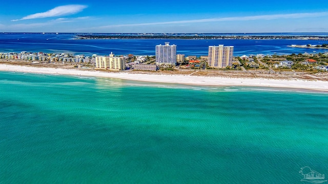 aerial view featuring a view of the beach and a water view