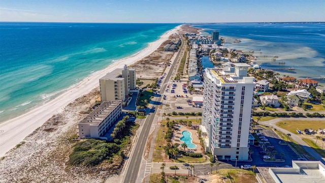 bird's eye view with a beach view and a water view