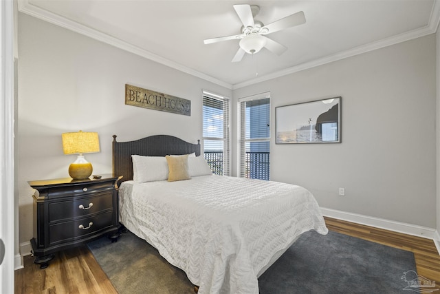 bedroom featuring dark wood-type flooring, ceiling fan, and crown molding