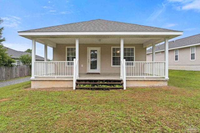 exterior space with a front lawn and covered porch