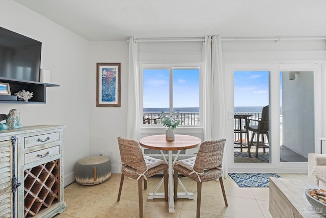 dining space with light tile patterned floors