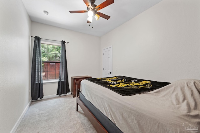 6781 Generals Ln, Pace, FL 32571 - bedroom with light colored carpet and a ceiling fan