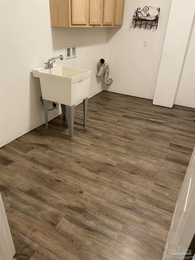 6781 Generals Ln, Pace, FL 32571 - laundry area featuring washer hookup, dark wood-type flooring, and cabinet space
