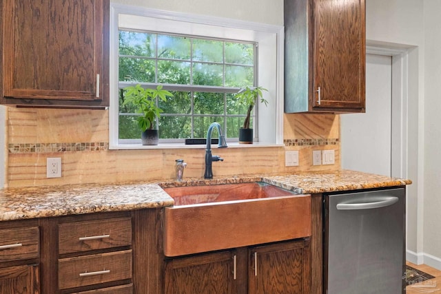 6781 Generals Ln, Pace, FL 32571 - kitchen featuring stainless steel dishwasher, tasteful backsplash, and light stone counters