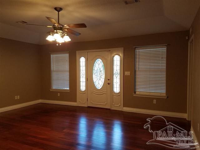 entrance foyer featuring ceiling fan and dark wood-type flooring