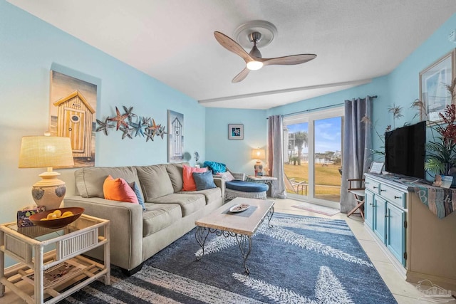 tiled living room with ceiling fan