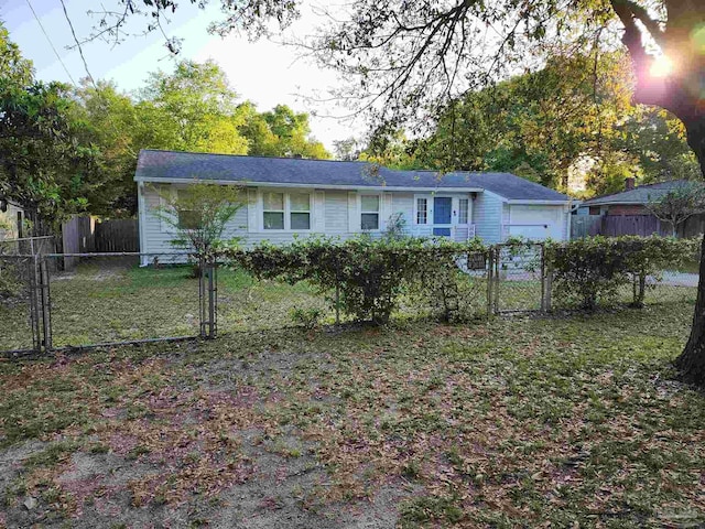 407 Rue Max St, Pensacola, FL 32507 - view of front of home featuring a garage and a gate