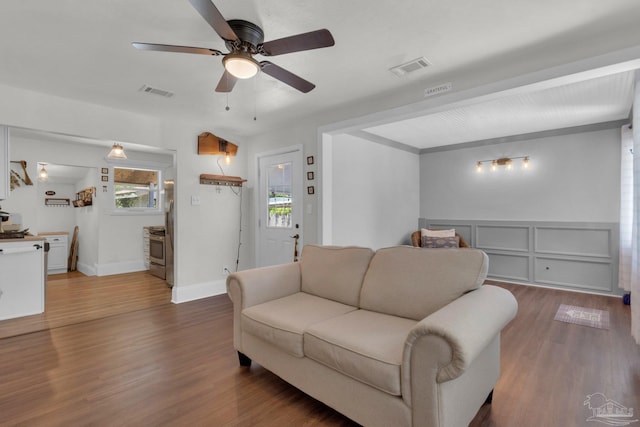 407 Rue Max St, Pensacola, FL 32507 - living room featuring ceiling fan, dark wood-style floors, and baseboards