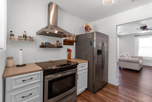 407 Rue Max St, Pensacola, FL 32507 - kitchen featuring stainless steel appliances, wall chimney exhaust hood, open shelves, dark wood finished floors, and white cabinetry