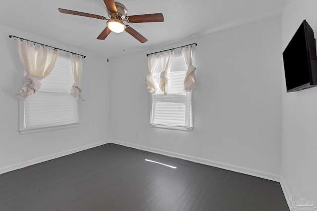 407 Rue Max St, Pensacola, FL 32507 - spare room with a ceiling fan, baseboards, and wood finished floors