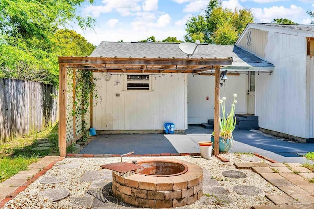 407 Rue Max St, Pensacola, FL 32507 - view of patio / terrace featuring an outdoor fire pit and fence