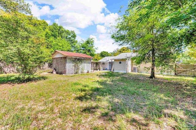 407 Rue Max St, Pensacola, FL 32507 - view of yard featuring an outbuilding