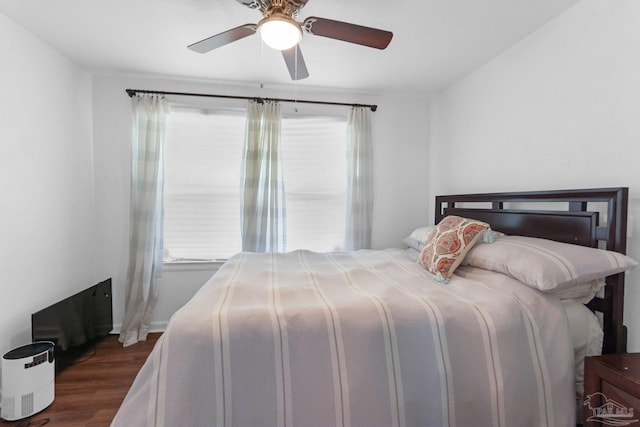 407 Rue Max St, Pensacola, FL 32507 - bedroom featuring dark wood-style floors, ceiling fan, and baseboards