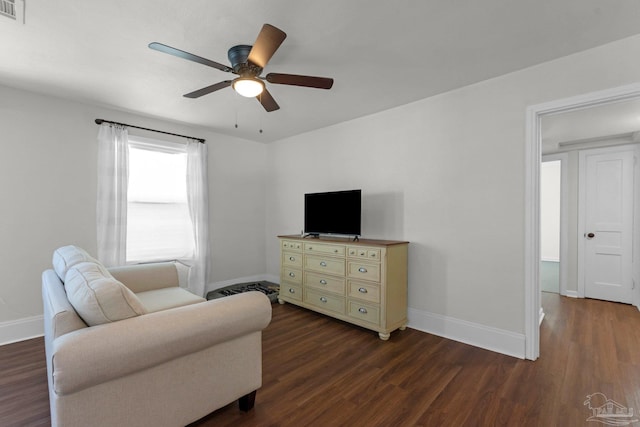 407 Rue Max St, Pensacola, FL 32507 - living area with dark wood-style flooring, baseboards, and ceiling fan