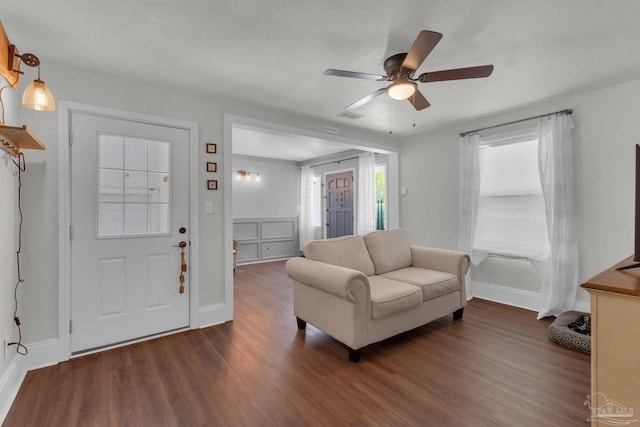 407 Rue Max St, Pensacola, FL 32507 - living room featuring a ceiling fan, dark wood-style flooring, and baseboards
