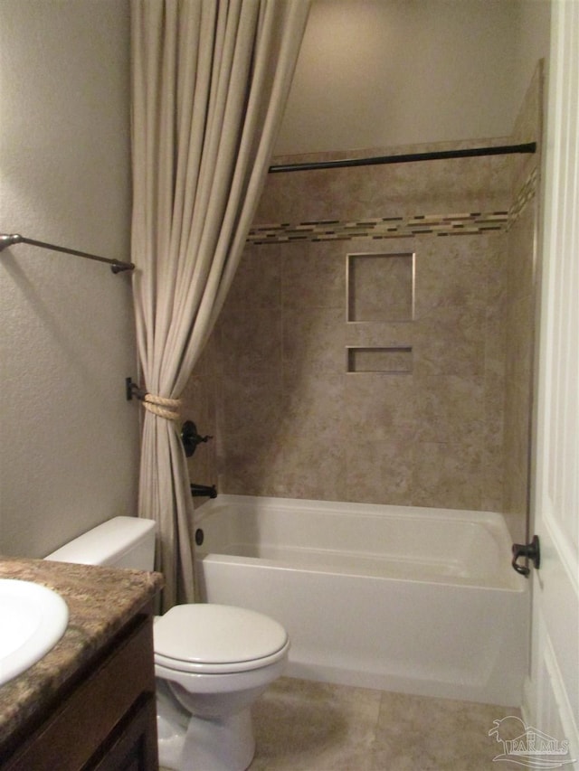 bathroom featuring toilet, shower / bath combination with curtain, tile patterned flooring, and vanity