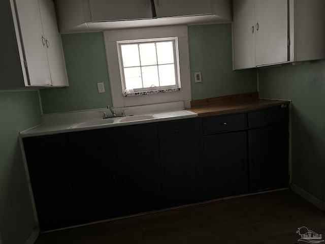 kitchen with sink and white cabinets