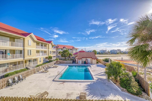 view of pool featuring a patio