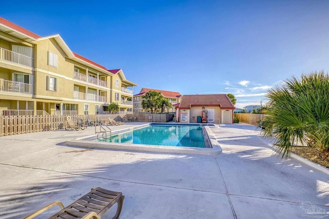 view of pool featuring a patio area