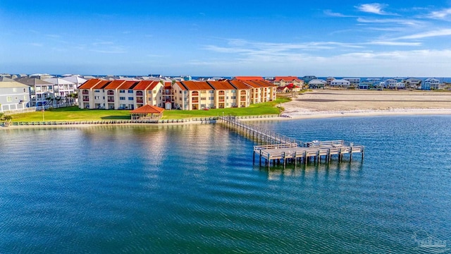 bird's eye view featuring a beach view and a water view