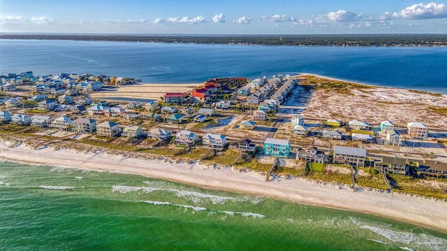 aerial view with a water view and a view of the beach