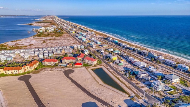 bird's eye view with a view of the beach and a water view