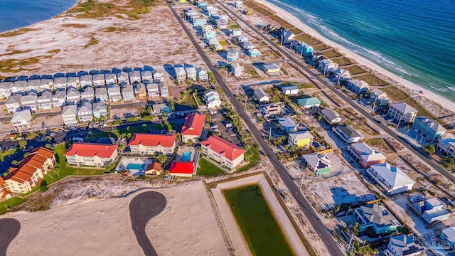 aerial view with a beach view and a water view