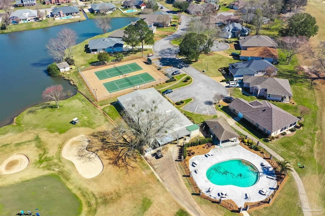 bird's eye view with a water view and a residential view