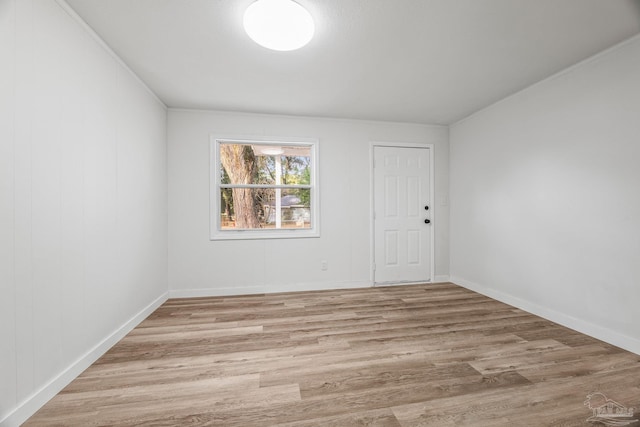 spare room with light wood-type flooring