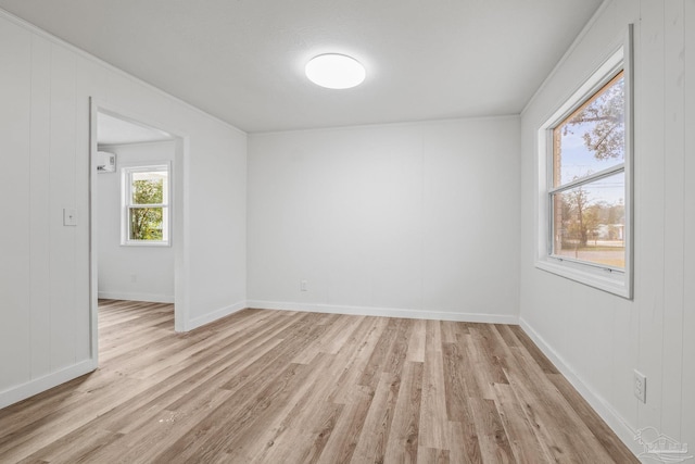 spare room featuring light wood-type flooring