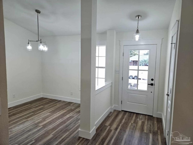 doorway with dark hardwood / wood-style floors