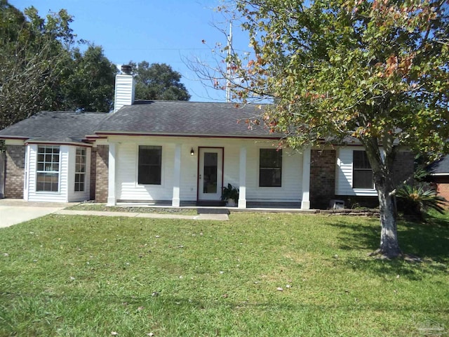 view of front facade with a porch and a front lawn