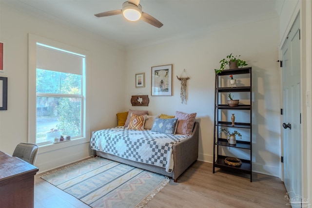 920 W Chase St, Pensacola, FL 32502 - bedroom featuring crown molding, ceiling fan, and light wood-type flooring