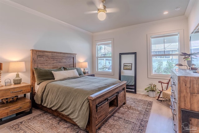 920 W Chase St, Pensacola, FL 32502 - bedroom with ornamental molding, ceiling fan, and light wood-type flooring