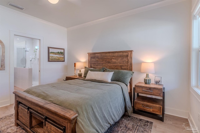 920 W Chase St, Pensacola, FL 32502 - bedroom featuring ornamental molding and light hardwood / wood-style flooring