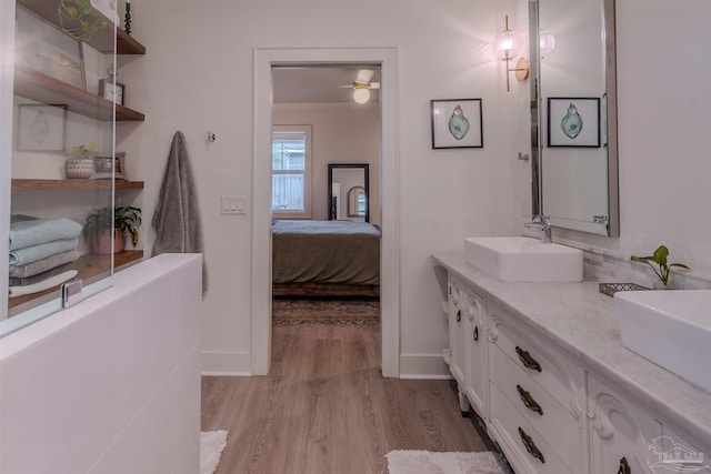 920 W Chase St, Pensacola, FL 32502 - bathroom featuring vanity and hardwood / wood-style floors