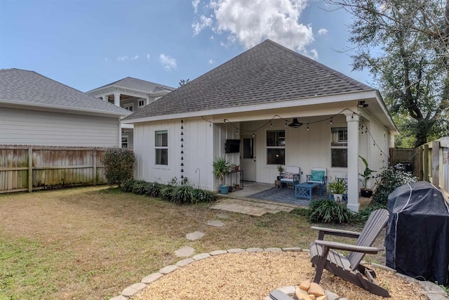 920 W Chase St, Pensacola, FL 32502 - rear view of house with a lawn, ceiling fan, and a patio area