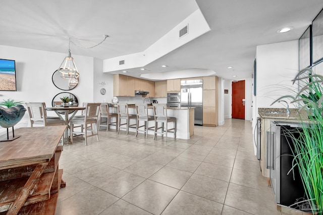 dining room featuring a notable chandelier, light tile patterned flooring, visible vents, and recessed lighting